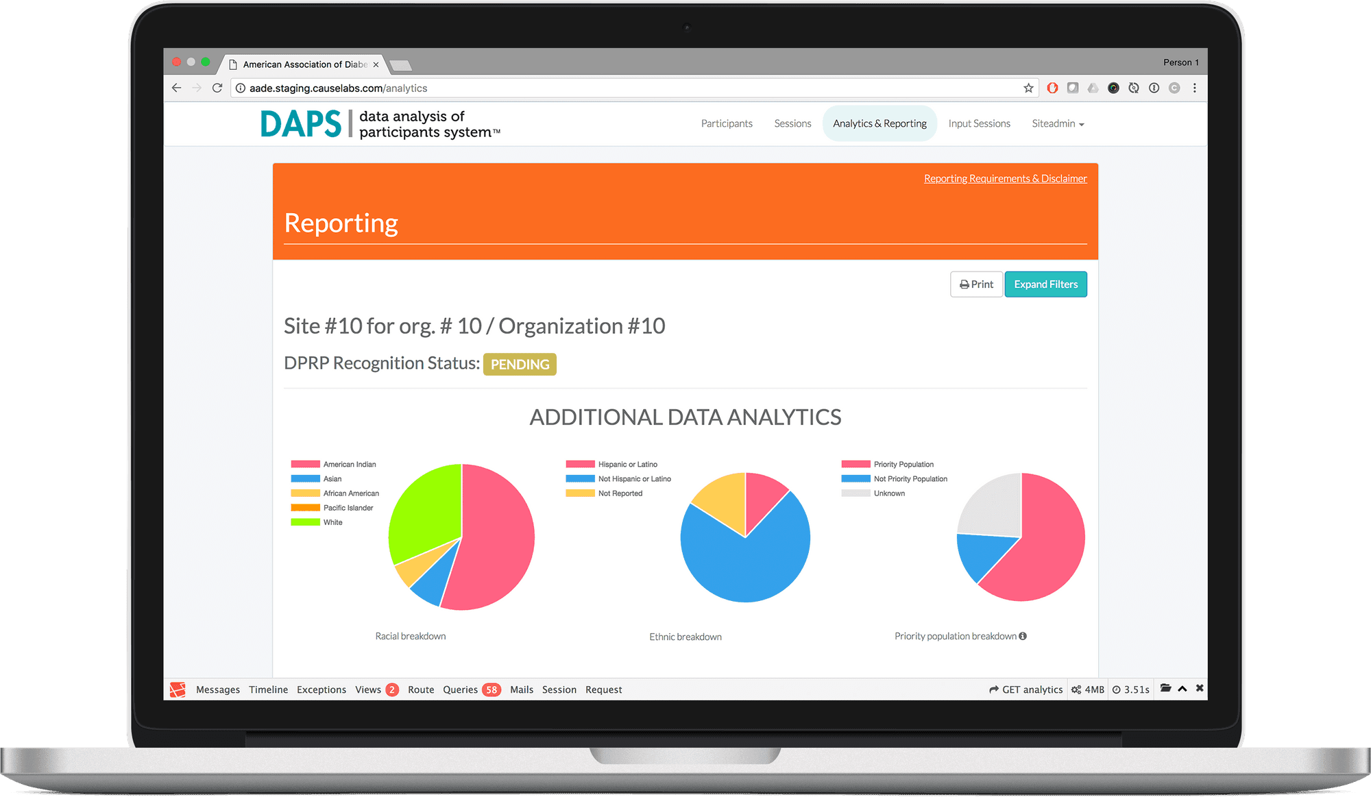 A laptop displaying the AADE platform.