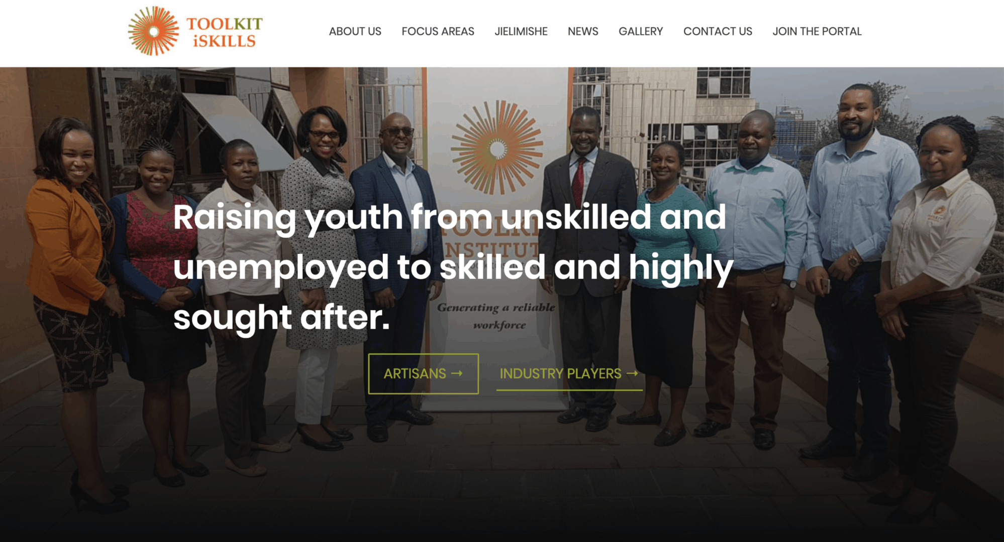 Toolkit iSkills homepage. Employees infront of Toolkit iSkills banner with words in white lettering overlaid stating, "Rising youth from unskilled and unemployed to skilled and highly sought after."