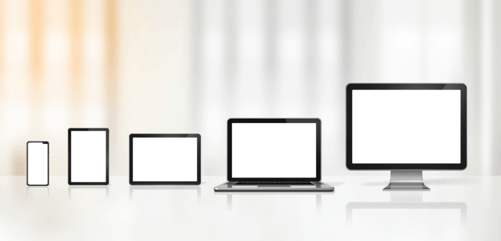 A good website is responsive. This is an image of screen sizes, the smallest on the left is a cell phone then an ipad, a bigger ipad, a laptop computer screen and the final a desktop screen. All screens are white and blank.