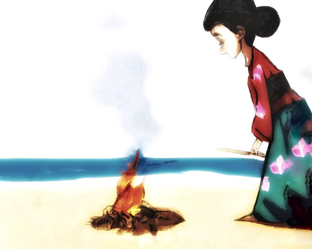 a woman tending a fire