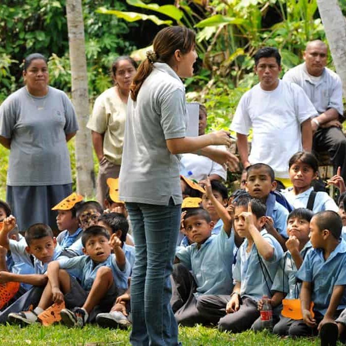 An image of CAVU's team doing a climate education training with youth.