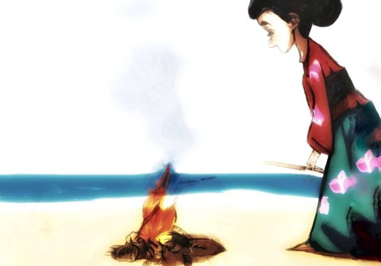 a woman tending a fire